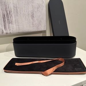 Brand new Dyson straighter box and travel pouch.